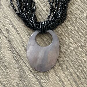 Black Beaded Necklace with Gray Pendant
